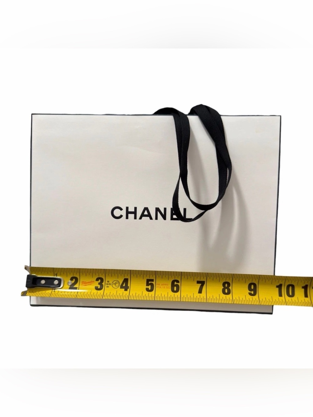 Authentic Chanel Paper Empty white
Gift Bag with Ribbon